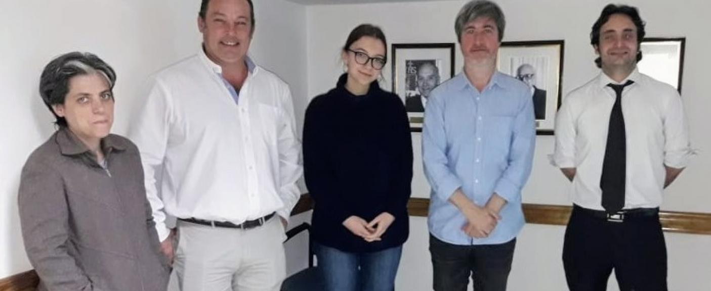 Pablo Forni y Guillermo Jensen, Director del Instituto de Investigación en Ciencias Jurídicas junto a miembros del Seminario Permanente de Investigación